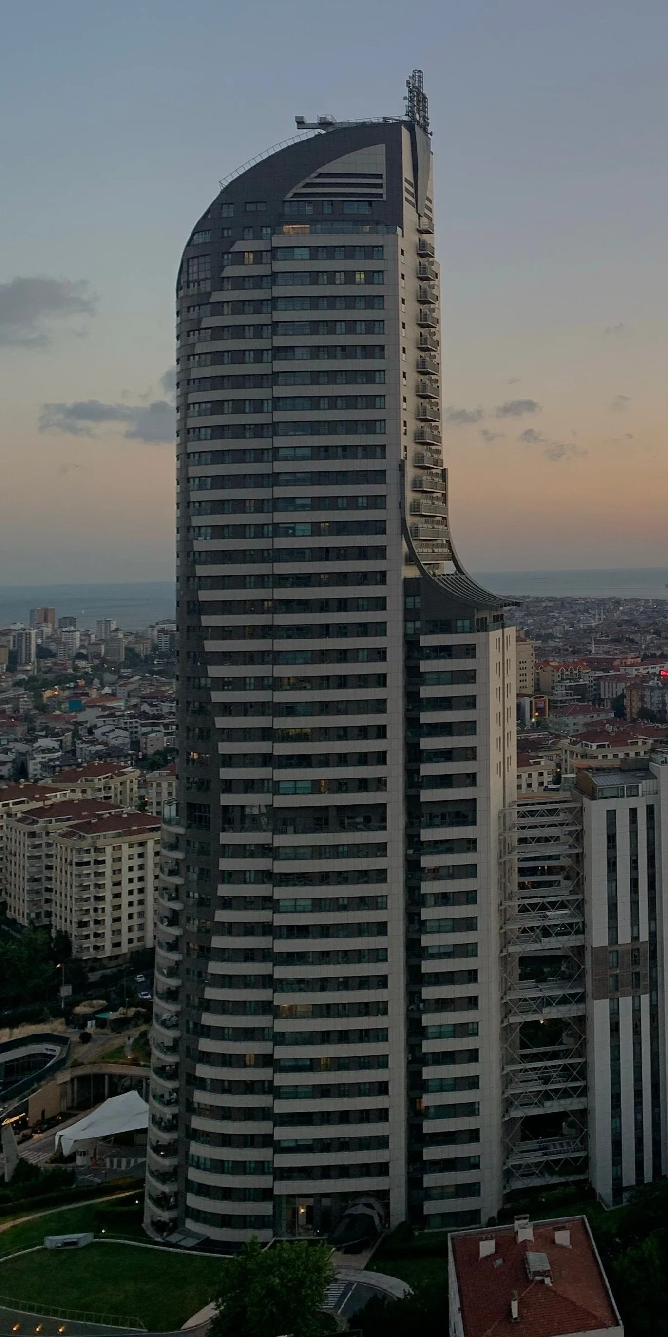 Akasya Koru residential tower at sunset