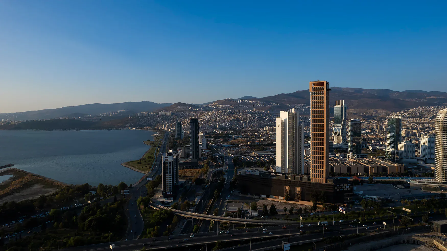 Ege Perla and the city skyline