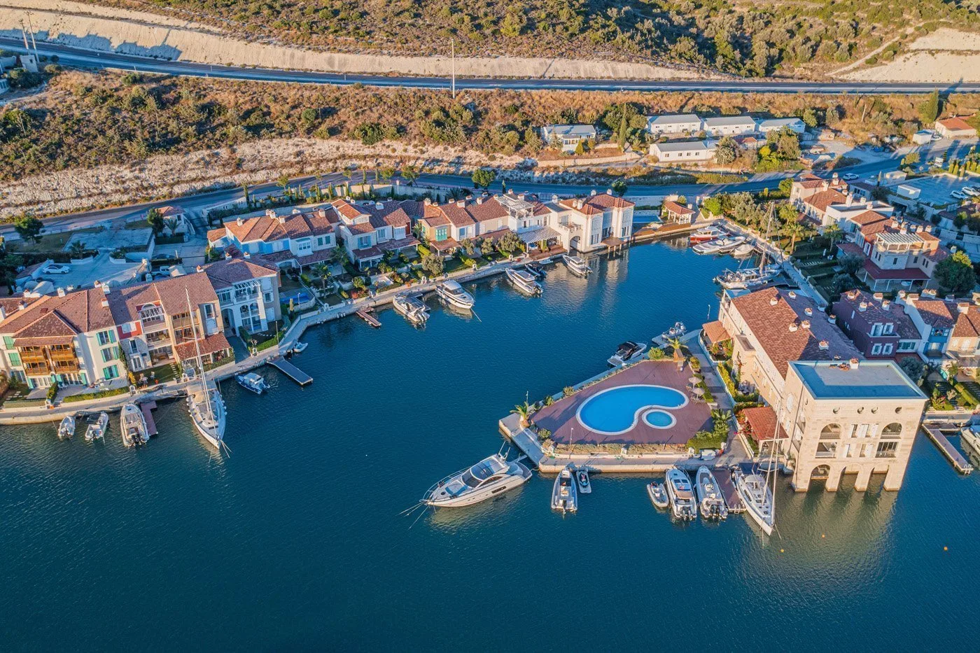 Port Alaçatı canal houses and marina from the air